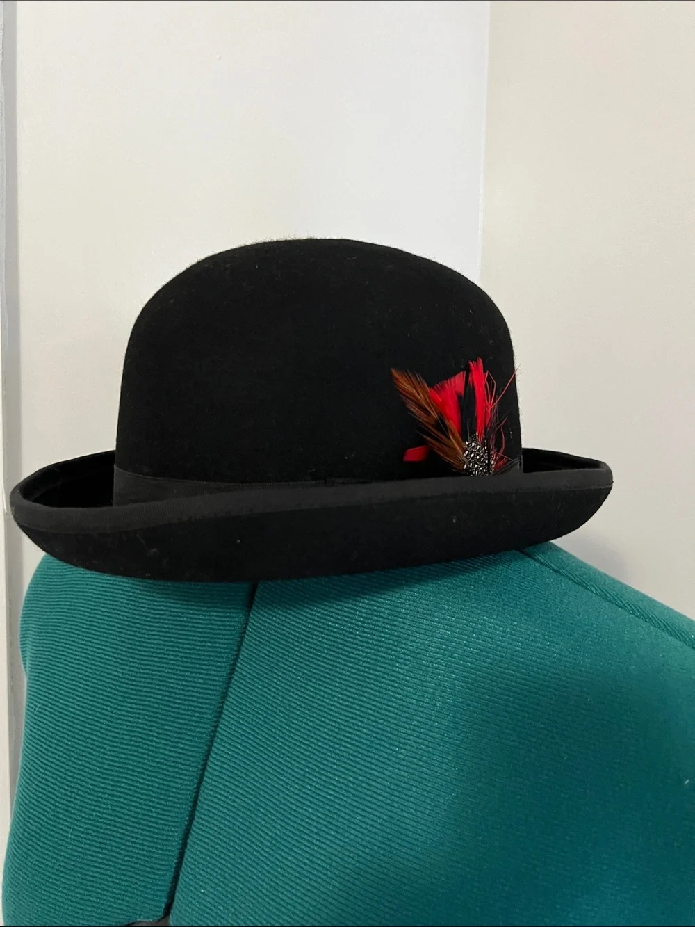 Women's Black Felt Bowler Hat with Red Feather Trim